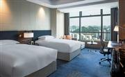 希爾頓豪華雙床房面積43平米，裝飾現代優雅-濟南魯能希爾頓酒店及公寓
